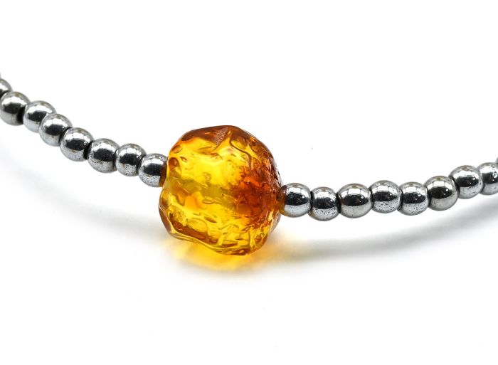 Hematite choker ball 2mm with amber insert 9mm, 40cm