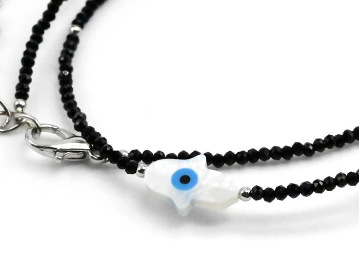 Hamsa amulet on a choker made of black spinel ball 2mm, 40cm.