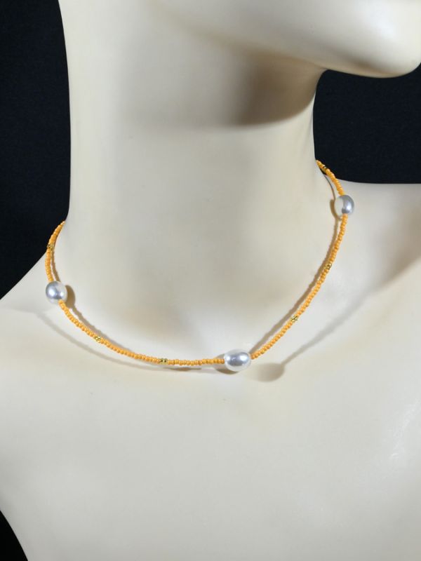 Beaded choker with majorca rondel 2*1mm orange color, 38cm